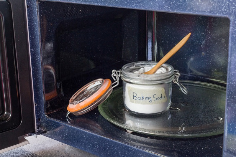Clean microwave with baking soda
