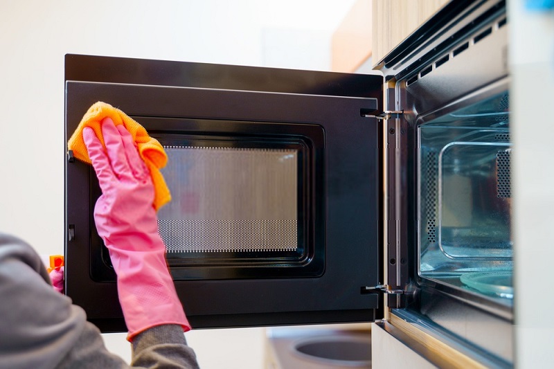 Cleaning greasy microwave doors